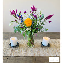Load image into Gallery viewer, Rustic farmhouse black candle stands for home décor. Bouquet of flowers in a vase with two candles on a wooden table.