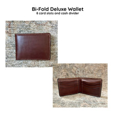 Load image into Gallery viewer, Brown bi-fold deluxe wallet with 8 card slots and cash divider on a textured surface.