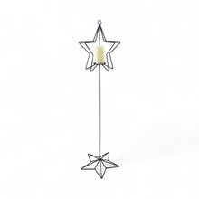 Load image into Gallery viewer, Farmhouse style Star-shaped Christmas candle holder with a candle on a white background