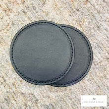 Load image into Gallery viewer, Two black round Leather Coasters.