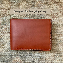 Load image into Gallery viewer, Brown leather wallet on a textured surface with text 'Designed for Everyday Carry'.