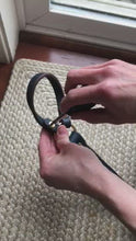 Load and play video in Gallery viewer, Leather bell hanger being opened and place through a door handle and then closed again