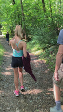 Load and play video in Gallery viewer, hiker bell ringing as family hikes through woods