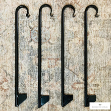 Load image into Gallery viewer, Black Powder Coated Hose Guide Garden Stakes with Hook at the top of the stake and a stability flag at the bottom
