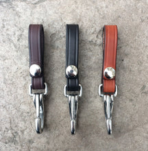 Load image into Gallery viewer, 3 colors of leather key fobs including dark brown, black and light brown.  Key Fobs have a snap to open and close around belt.