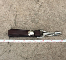 Load image into Gallery viewer, Dark Brown Leather Key chain next to a tape measure showing an approximate length of 5.5 inches