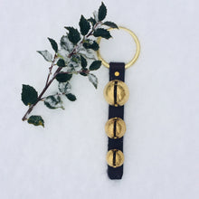 Load image into Gallery viewer, 3 solid brass sleigh bells on leather strap with brass-plated ring door hanger for home décor