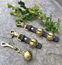 Load image into Gallery viewer, All three bell options including single bell on snap, one bell on leather with scissors clasp and 2 bells on leather with scissors clasp