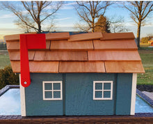 Load image into Gallery viewer, Side view of a blue barn mailbox with the flag up.