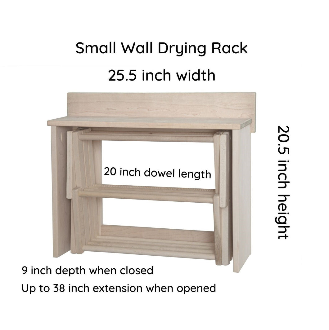 The small wall drying rack is 25.5 inches wide, and 20.5 inches high.  The dowel length is 20 inches wide.