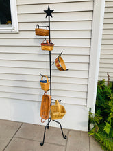 Load image into Gallery viewer, Basket tree stand pictured outside holding 6 baskets.  Basket tree holds up to 8 baskets.  Star ornament on the top of the stand.