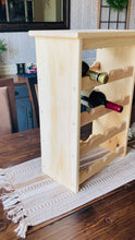 Load and play video in Gallery viewer, video of wooden wine rack in a farmhouse style dining room
