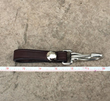 Load image into Gallery viewer, Dark Brown Leather Key chain next to a tape measure showing an approximate length of 5.5 inches
