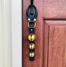 Load image into Gallery viewer, 3 Solid Brass Sleigh Bells hanging on a front door handle
