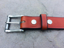 Load image into Gallery viewer, close up picture of the stainless steel buckle on a light brown heavy duty leather belt
