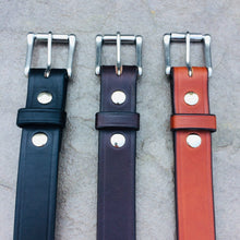 Load image into Gallery viewer, 3 heavy work belts in black, dark brown, and light brown lined up showing the buckle end of the belts
