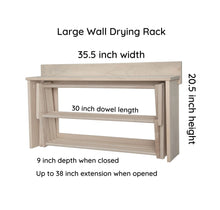 Load image into Gallery viewer, The Large Wall Drying rack is 25.5 inches wide, 20.5 inches high and the dowel length is 30 inches.
