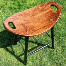 Load image into Gallery viewer, Top angle of saddle stool with a Michael&#39;s Cherry stained seat.
