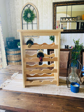 Load image into Gallery viewer, wine bottle shelf sitting on a table surrounded with farmhouse style home decor

